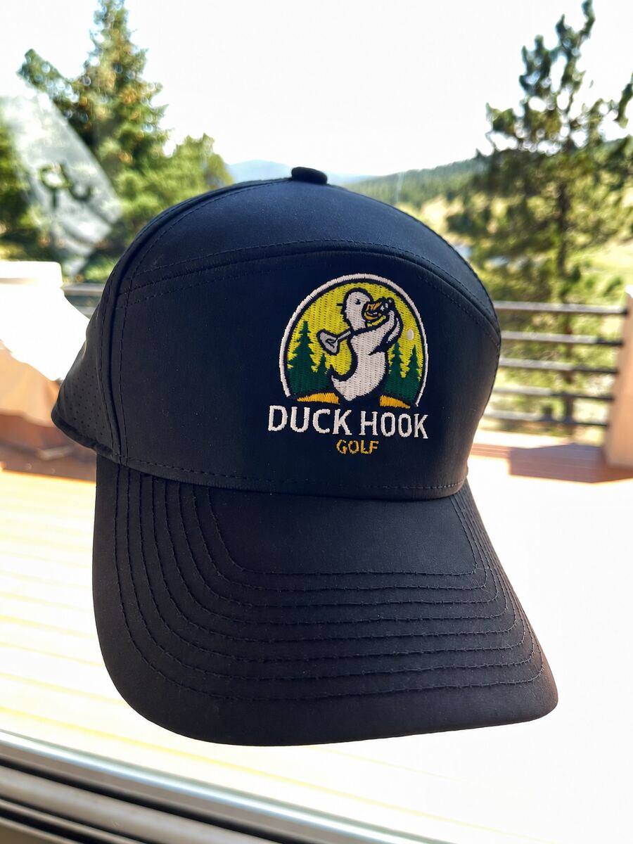 Black Duck Hook Golf performance hat with full-color embroidered logo